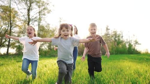 Kids enjoying active outdoor play and physical activity